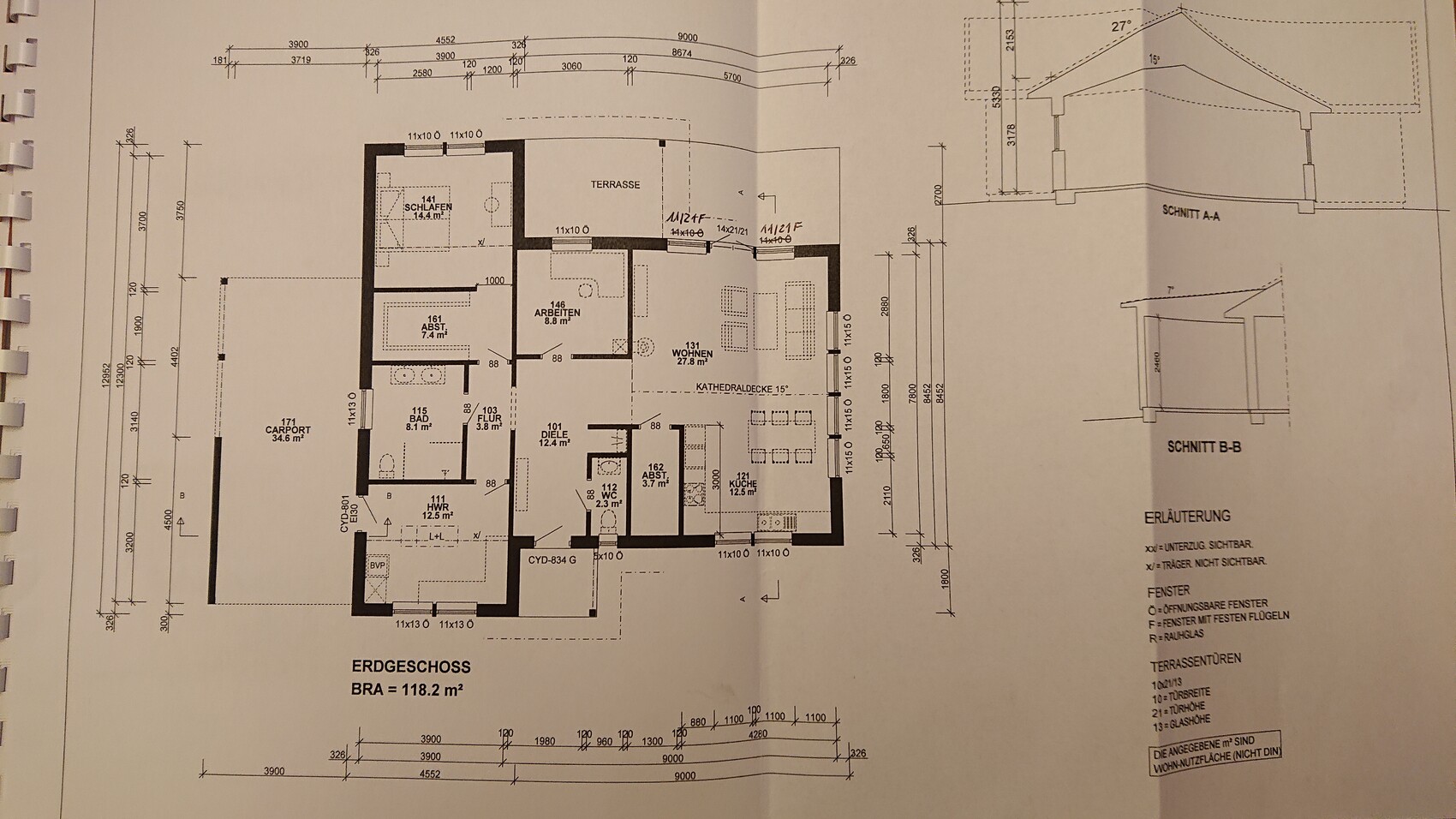 Grundriss Erdgeschoss: Carport, Terrasse, Flur, Küche, Bad, Schlafen, Wohnen.
