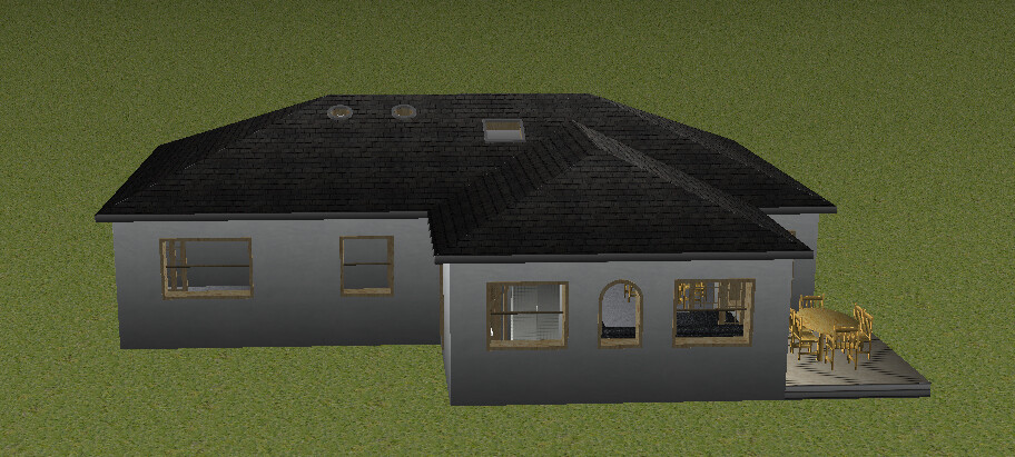 Haus mit dunklem Dach, graue Fassade und Terrasse mit Esstisch und Stühlen.