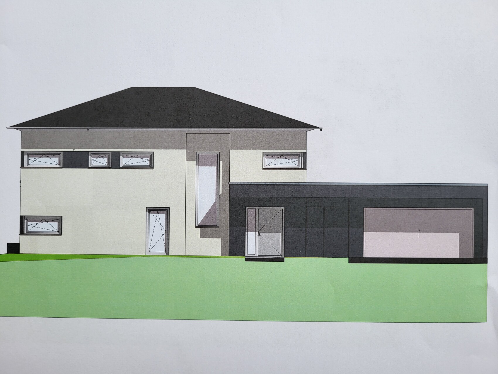 Zweistöckiges Haus mit heller Fassade und dunkler Garage rechts auf grünem Rasen.