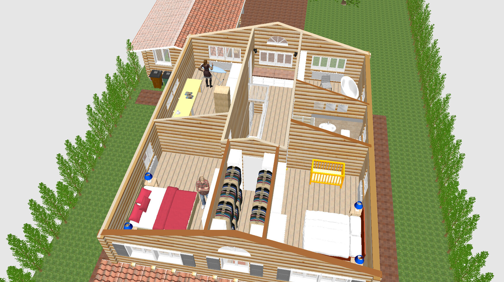 Schnittmodell eines Holzhauses mit Küche, Schlafzimmer, Bad, Treppe und Garten; zwei Personen im Haus.