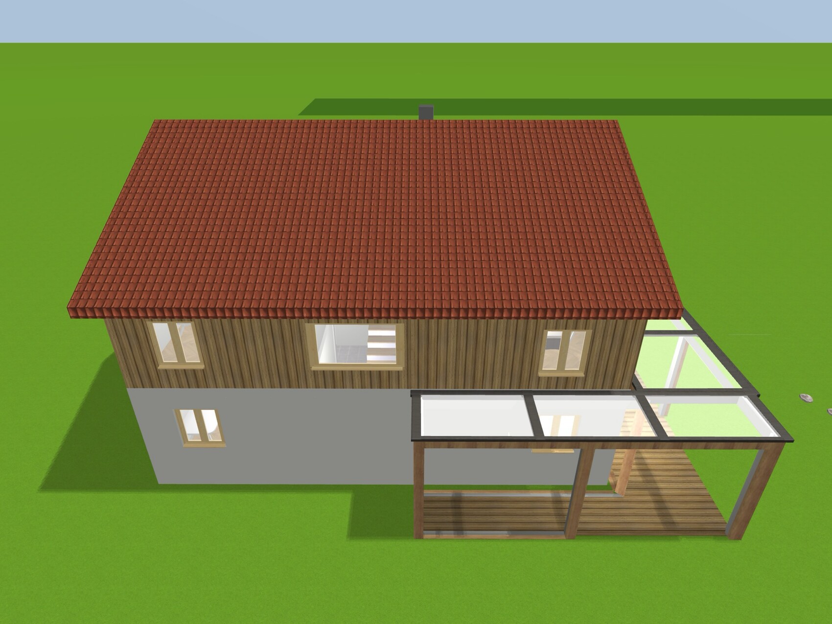 Vogelperspektive: Zweistöckiges Haus mit rotem Ziegeldach, Holzfassade und Glas-Anbau.