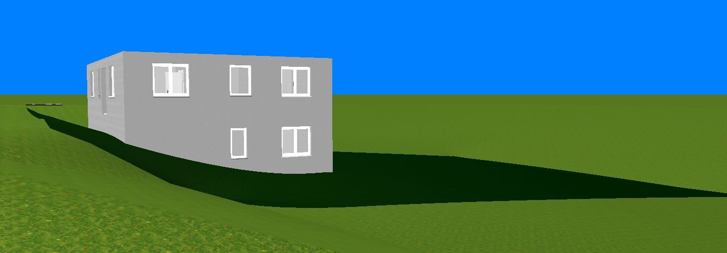 Kleines hellgraues 3D-Hausmodell auf grünem Hang vor blauem Himmel.