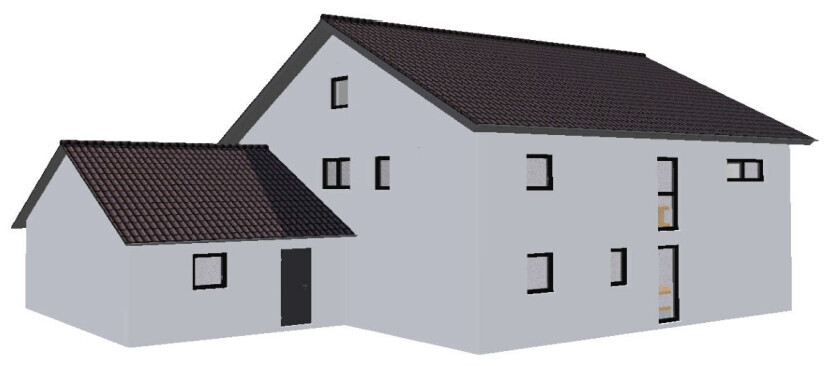 Graues Mehrfamilienhaus mit Satteldächern, Anbau und vielen Fenstern.