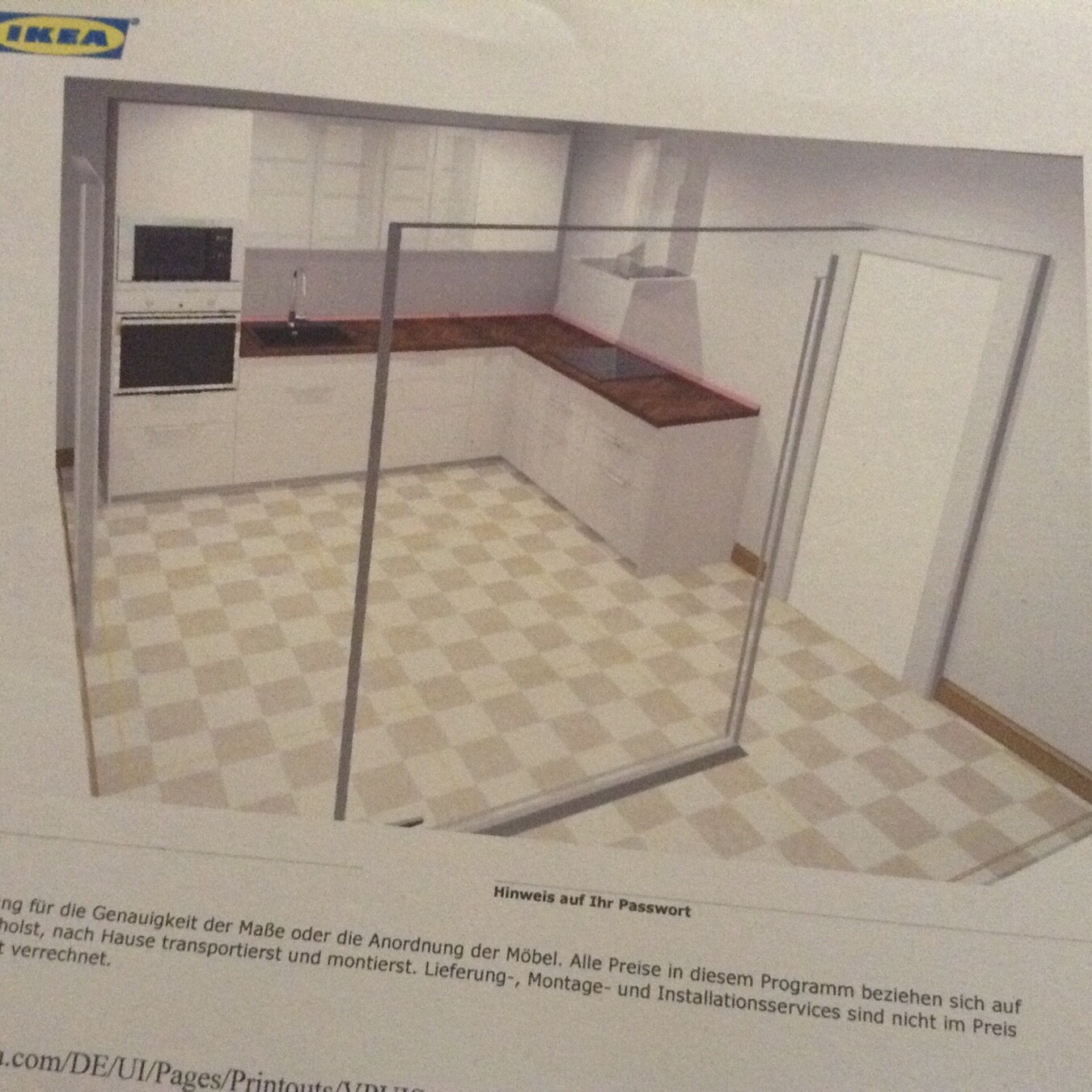 Weiße Küchenzeile mit dunkler Holz-Arbeitsplatte, Spüle, Ceranfeld und Backofen; IKEA-Logo sichtbar.