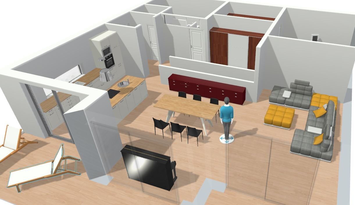 Offene Wohnküche mit Esstisch, Küchenzeile, Wohnlandschaft, TV und Person im Zentrum.