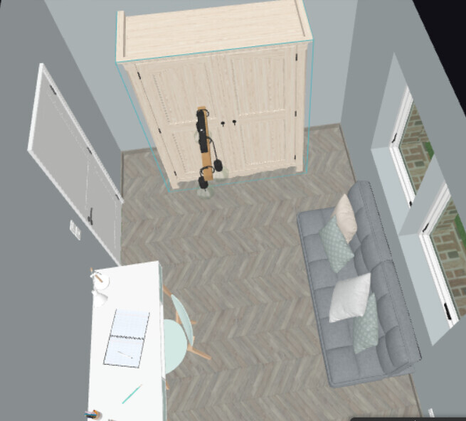 Vogelperspektive eines Zimmers: Sofa rechts, Schrank in Mitte, Gitarre davor, Schreibtisch links.
