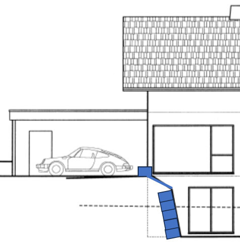 Außenansicht eines Hauses mit Carport und externer Treppe zum Eingang