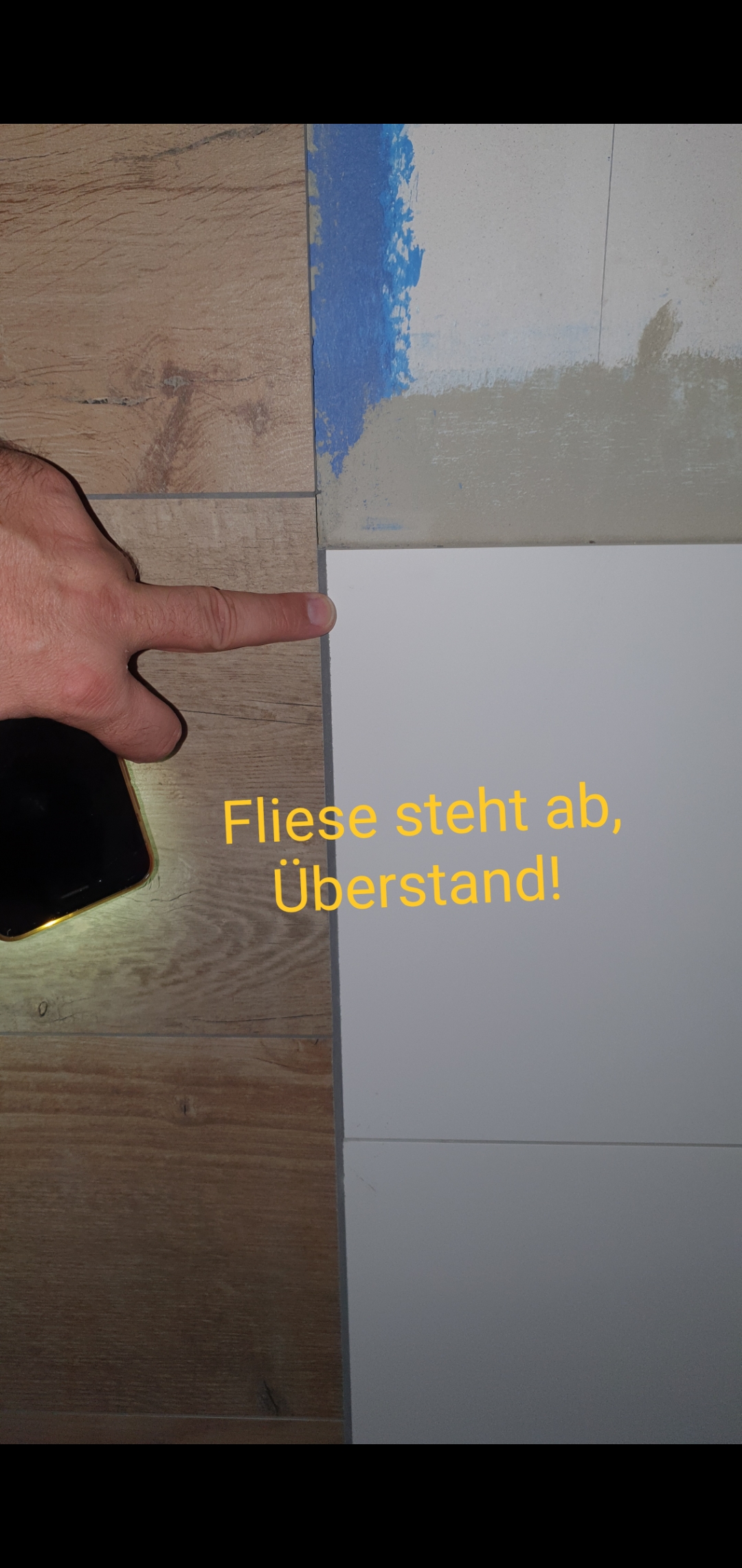 arbeiten-des-fliesenlegers-zum-bemaengeln-350982-1.jpg