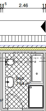 Grundriss eines Badezimmers mit Toilette, Waschbecken und Badewanne.