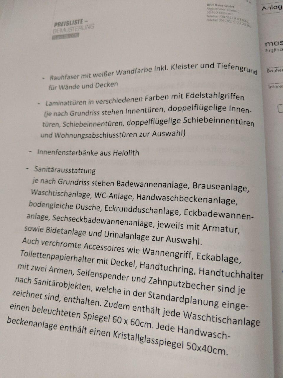 Seitenansicht eines Katalogblatts mit Textpassagen zu Sanitär- und Badezimmerausstattung