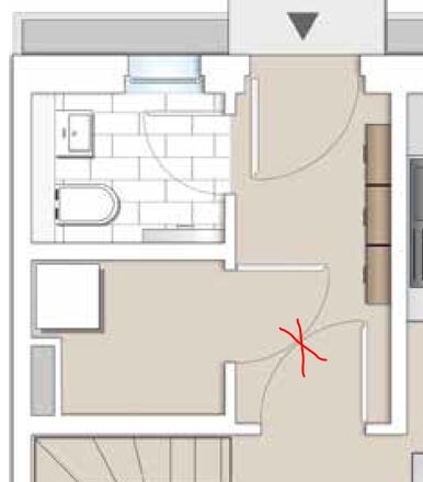 Grundrissplan eines Badezimmers mit Türöffnung und Fliesenboden