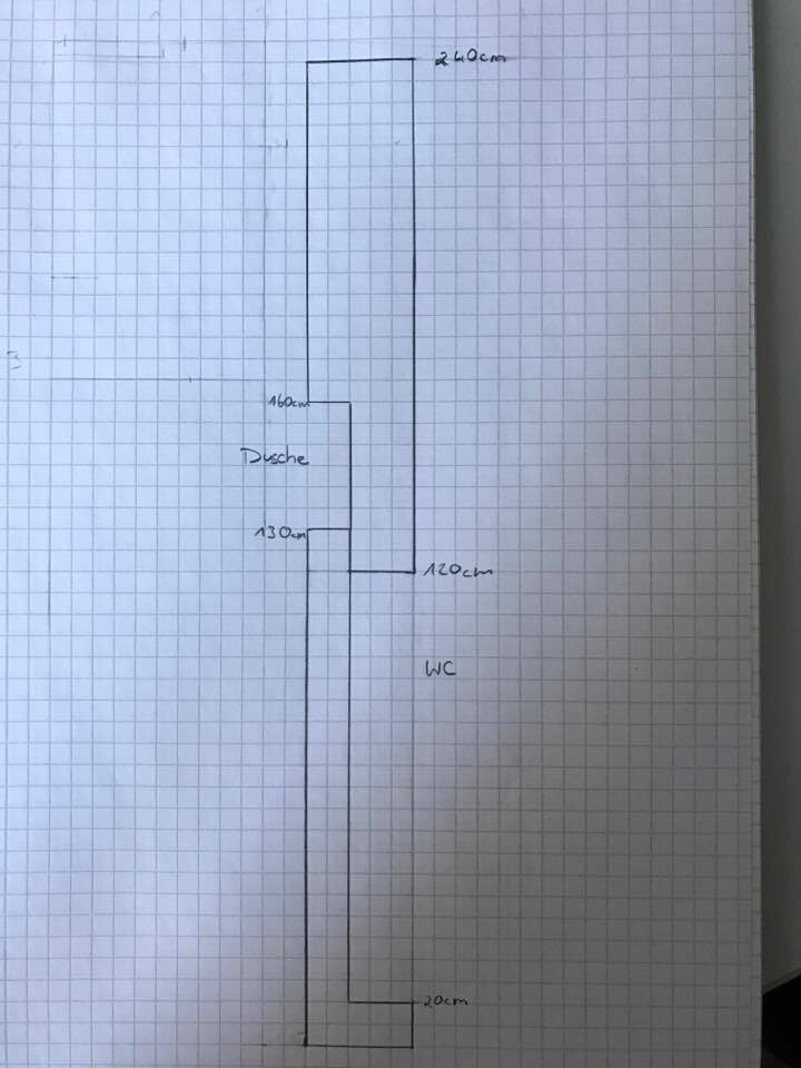2D Grundriss eines Badezimmer-Layouts mit Dusche und WC auf Graphpapier