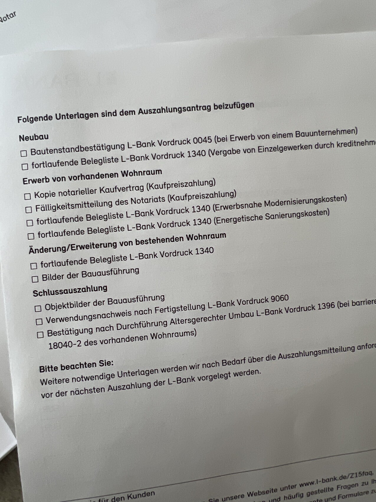 Formular mit Checkboxen und Unterlagenliste zum Auszahlungsantrag (Neubau, Wohnraum)