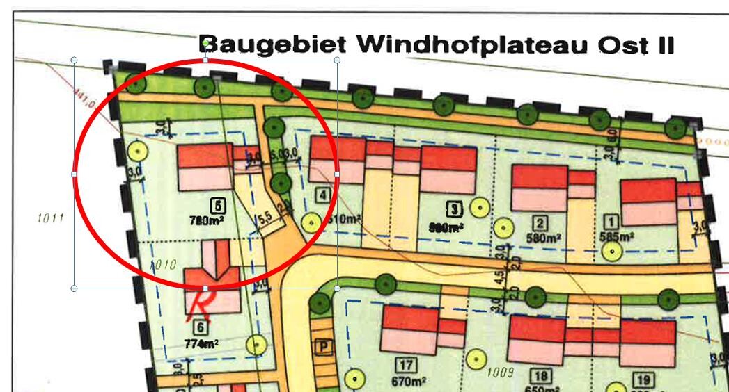Lageplan eines Baugebiets mit Parzellen, Straßen und Grünflächen