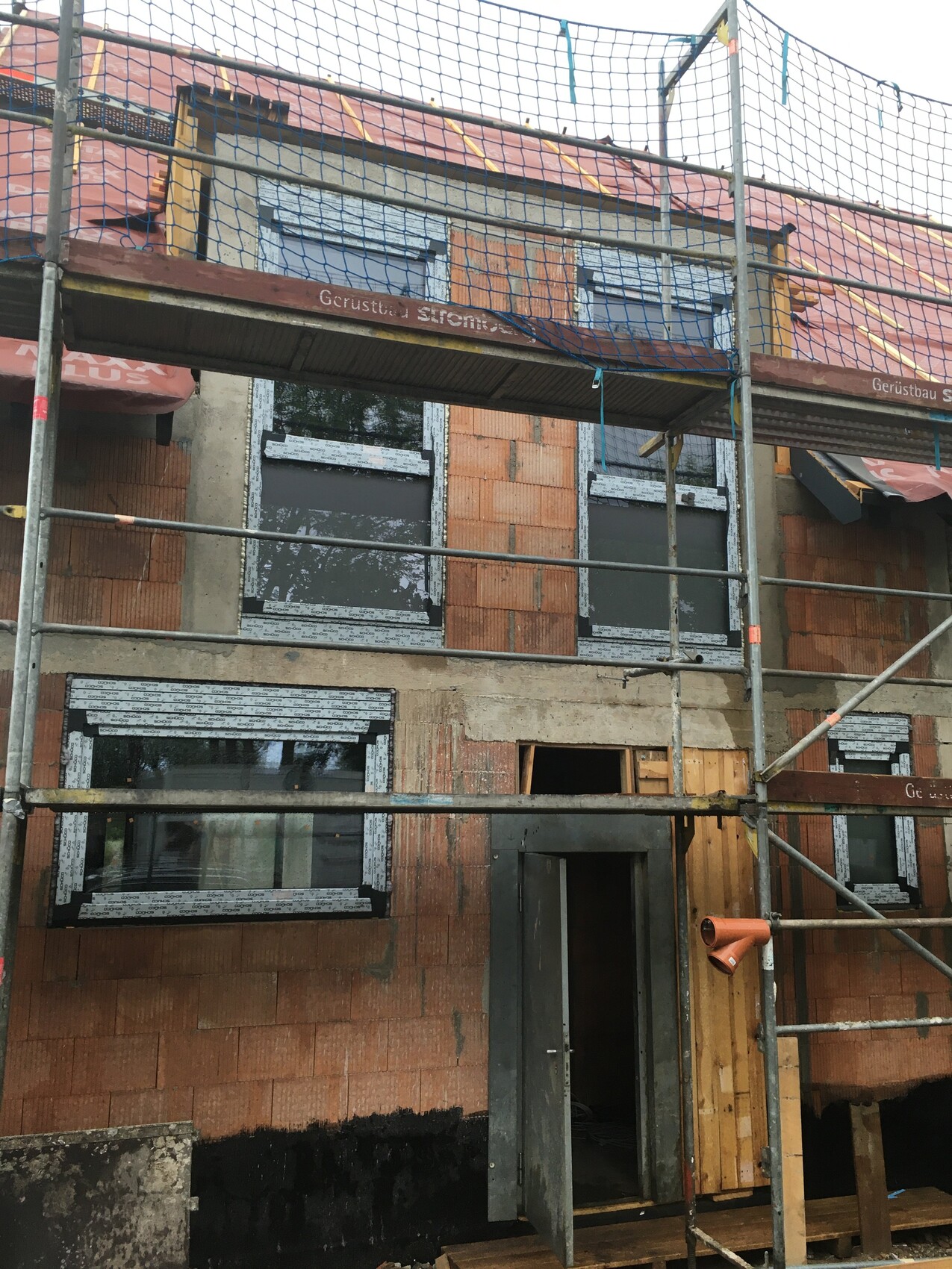 baustelle-hausbau-mauerwerk-unter-konstruktion.JPG
