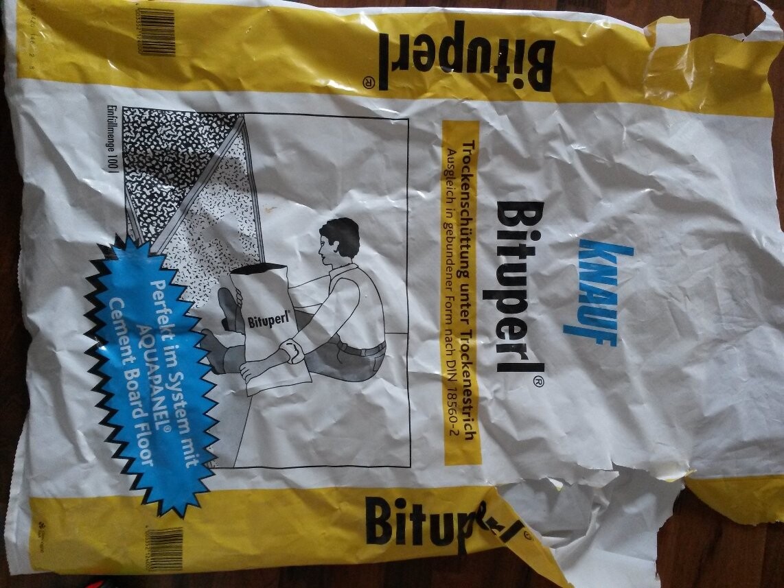 Bauverpackung Bituper mit Gelb-Weißem Design und Handwerker Illustration