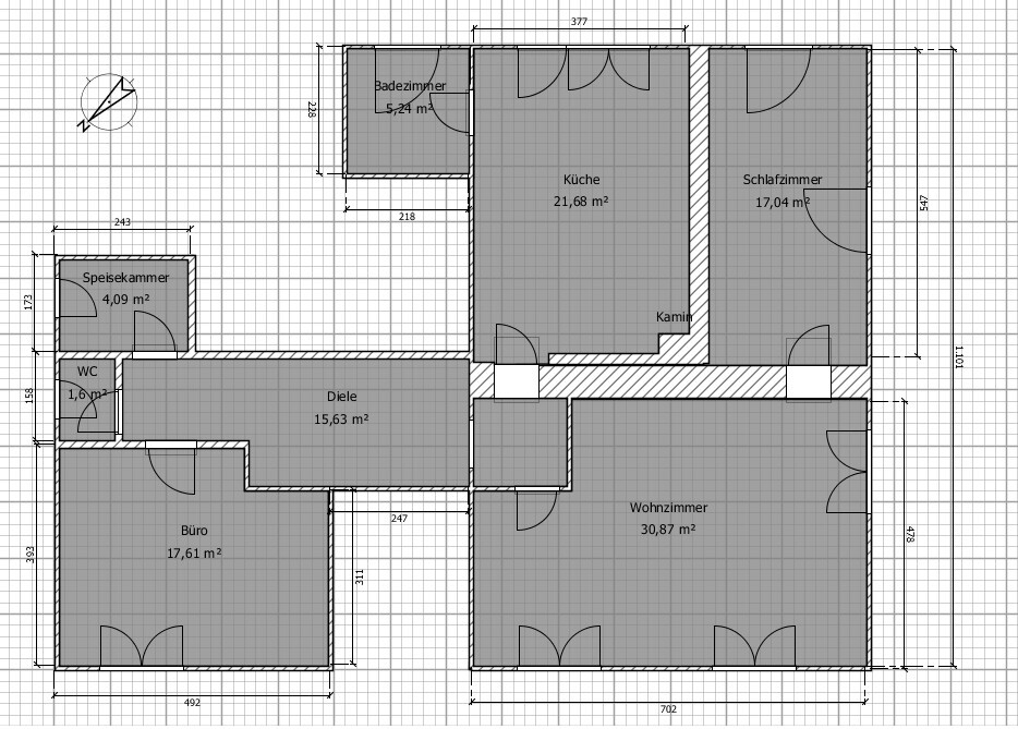 Detailierter Grundriss eines Hauses mit Diele, Wohnzimmer, Küche, Schlafzimmer, Bad und WC