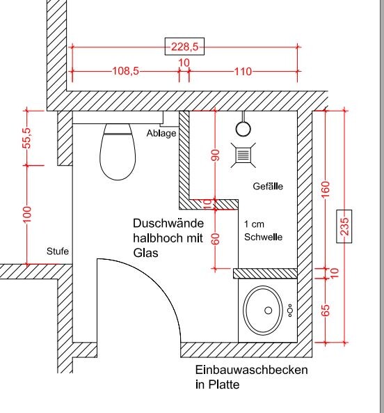 Grundriss eines Badezimmers mit Duschwand halbhoch aus Glas, Toilette, Ablage und Einbauwaschbecken.