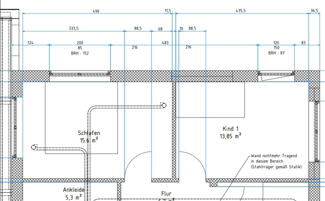 Grundrissplan eines Wohnhauses: Schlafzimmer, Ankleide, Flur und Kind 1 Raum mit Maßangaben.