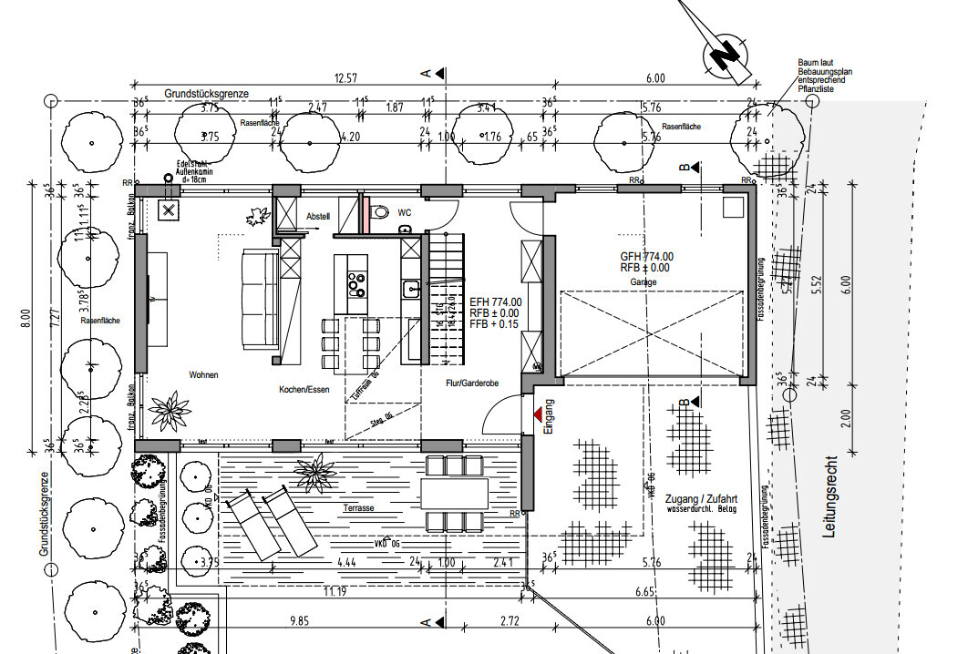 Grundriss eines Hauses: Wohnen, Kochen/Essen, Flur, Abstell, WC, Eingang, Garage, Terrasse, Garten.