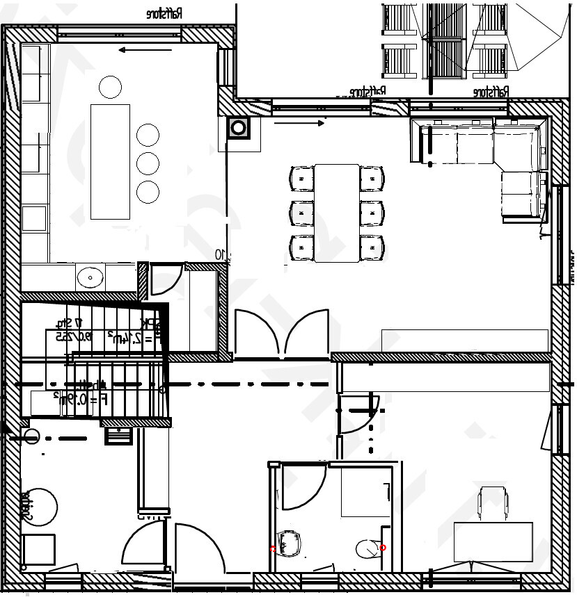 Grundriss eines Hauses: Küche mit Esstisch links, zentraler Essbereich, rechts Wohnzimmer und Flur.