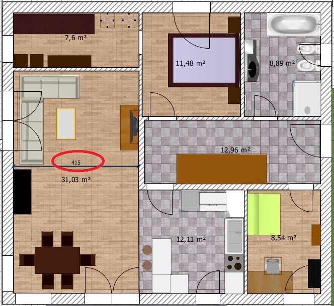 Grundriss einer Wohnung: Wohnzimmer mit Esstisch, Küche, zwei Schlafzimmer, Bad.
