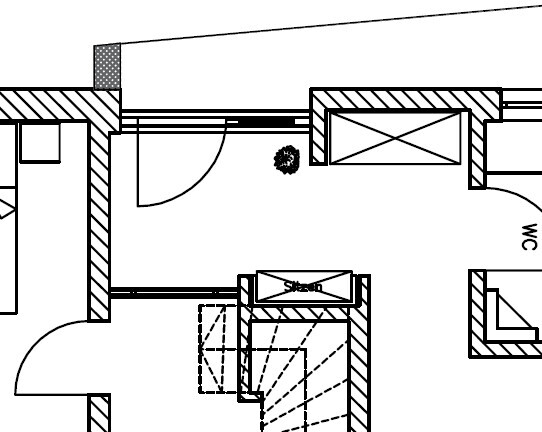 Grundriss eines Innenraums mit Treppenhaus, Türen und Möbeln.