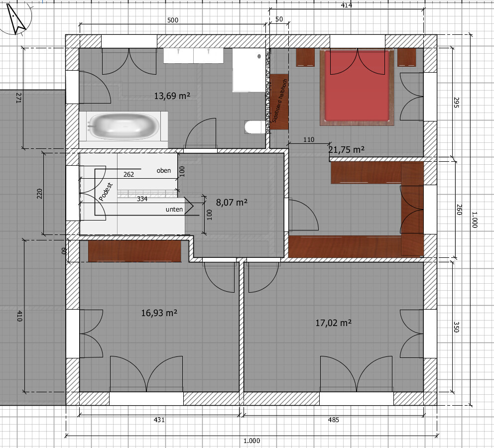 Grundriss eines Hauses mit Bad, Treppe, Schlafzimmer und zwei großen Wohnräumen.
