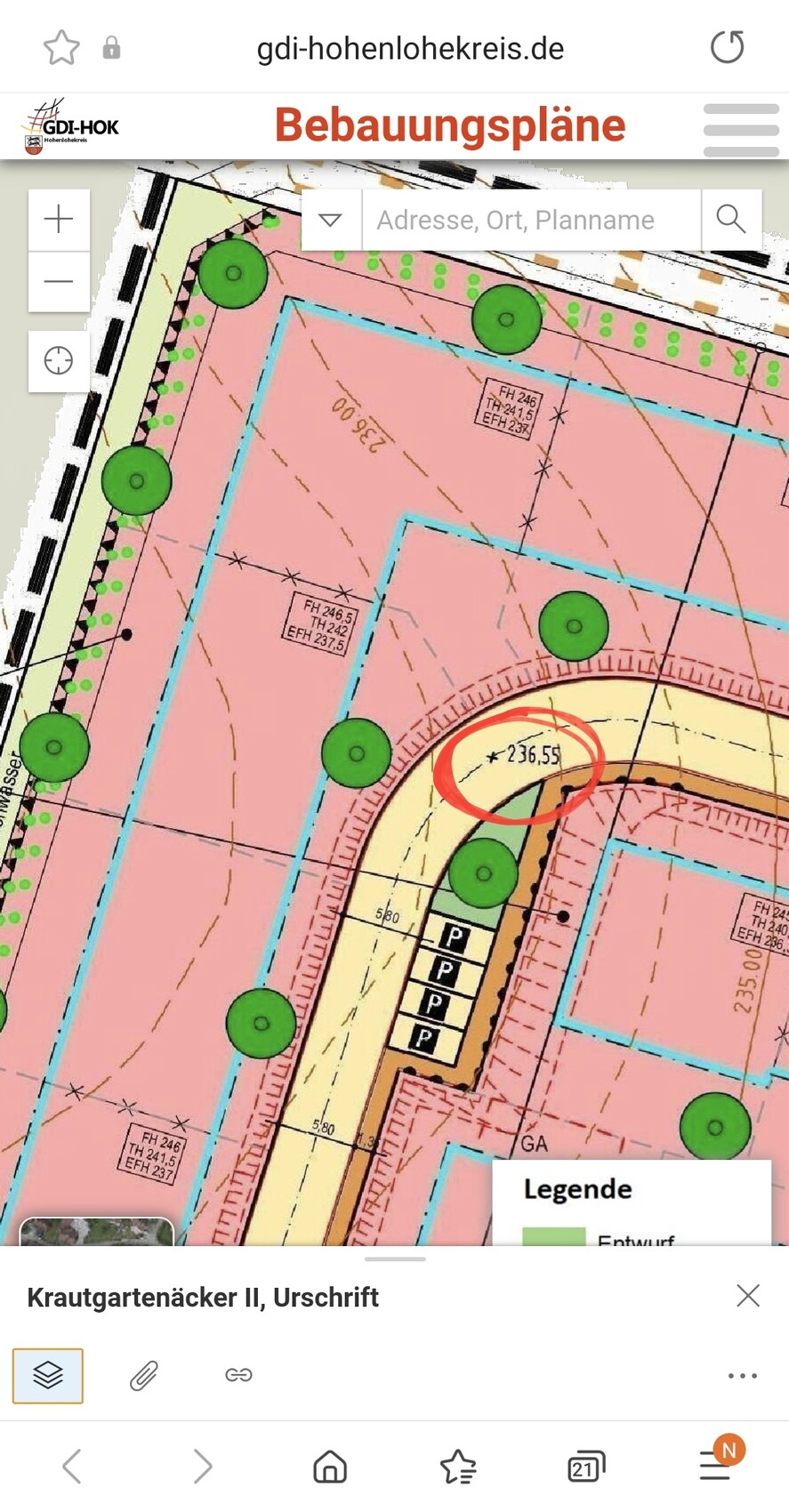 Bebauungsplan mit farbigen Zonen, Straßenverlauf, Bäumen und Parkplätzen; roter Kreis um 236,55.