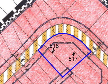 Lageplan eines Baugrundstücks mit roter Fläche, blauem Gebäudeumriss und Nummern 517 518