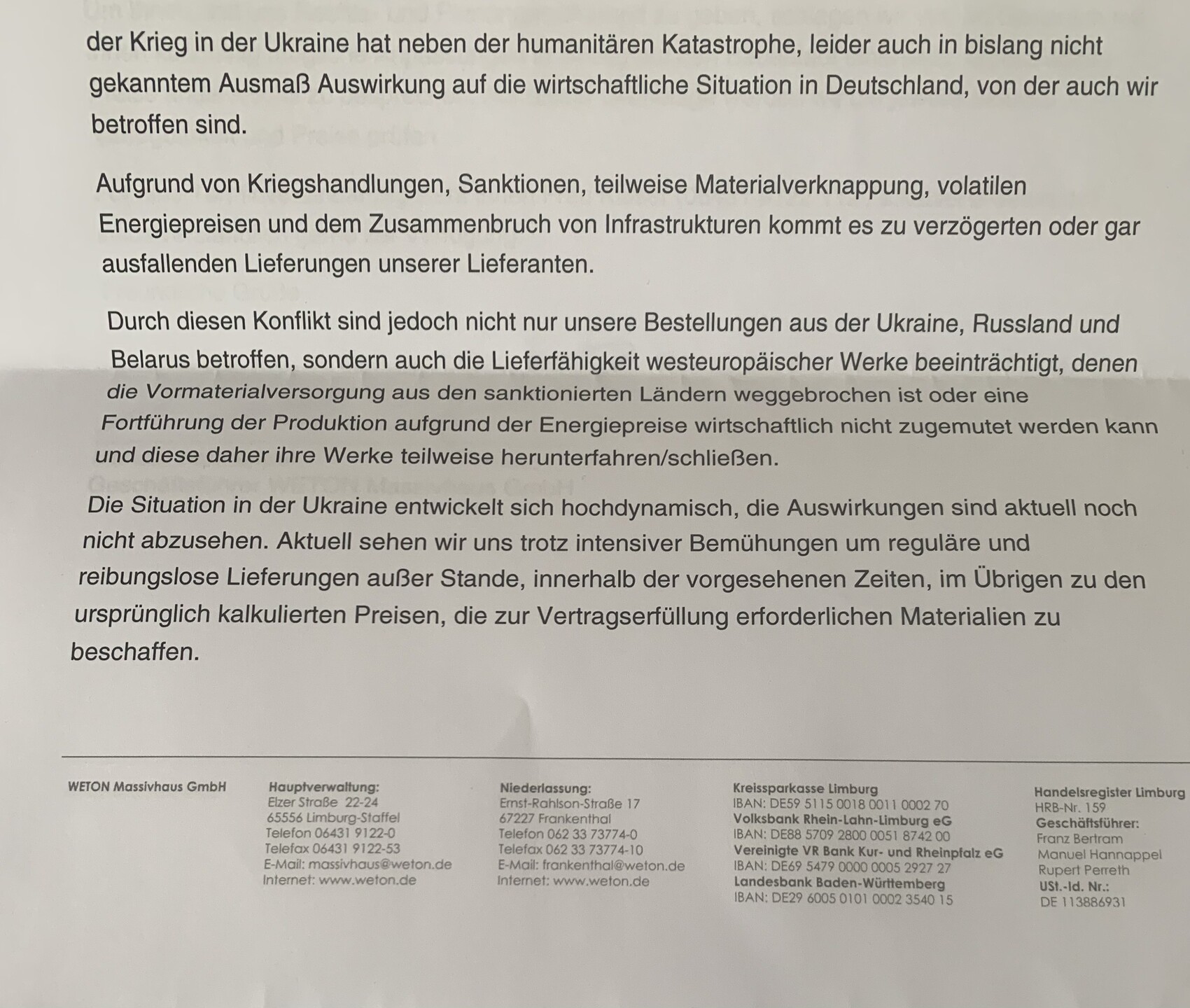 Gedrucktes Textdokument mit Absätzen und Firmenfußzeile am unteren Rand.