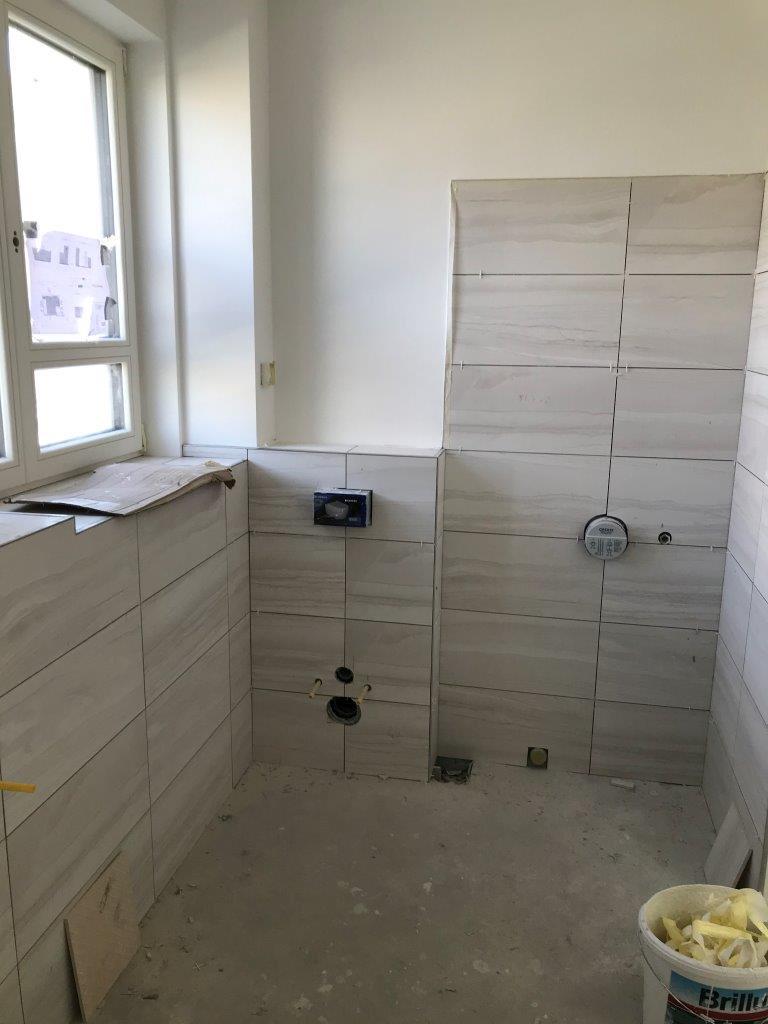 duschabdichtung-von-wand-boden-in-einem-arbeitsgang-din-18534-413926-2.jpeg