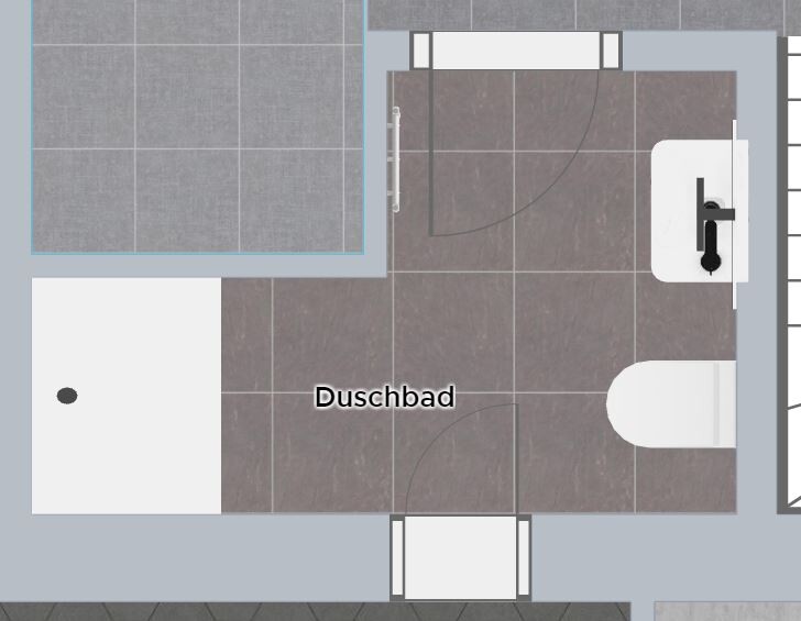 Duschbad Grundriss: Dusche oben links, Waschbecken rechts, Toilette unten rechts, Fliesenboden.