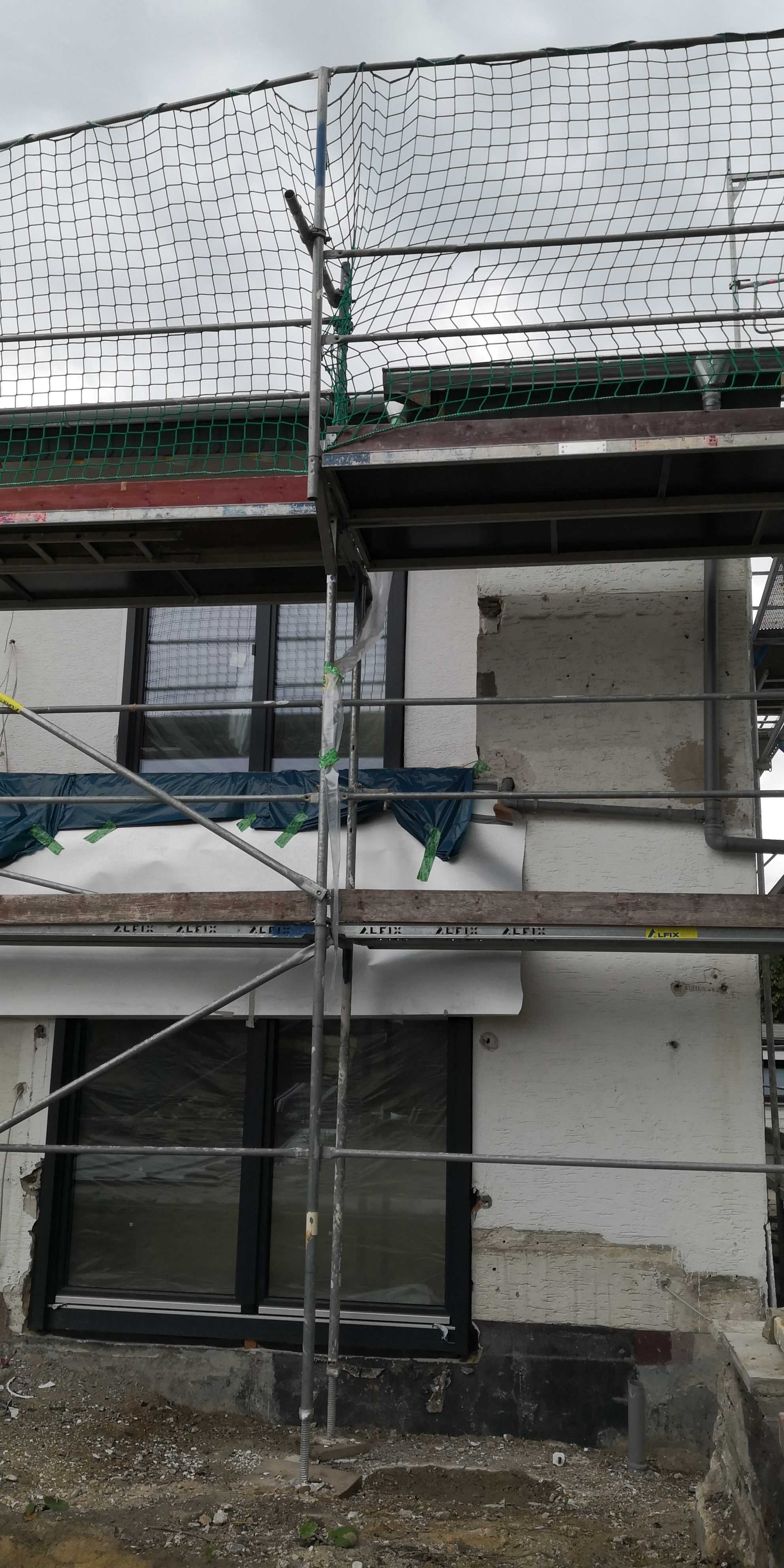 ebenerdiger-terrassenaustritt-bei-fassadendaemmung-413037-1.jpeg