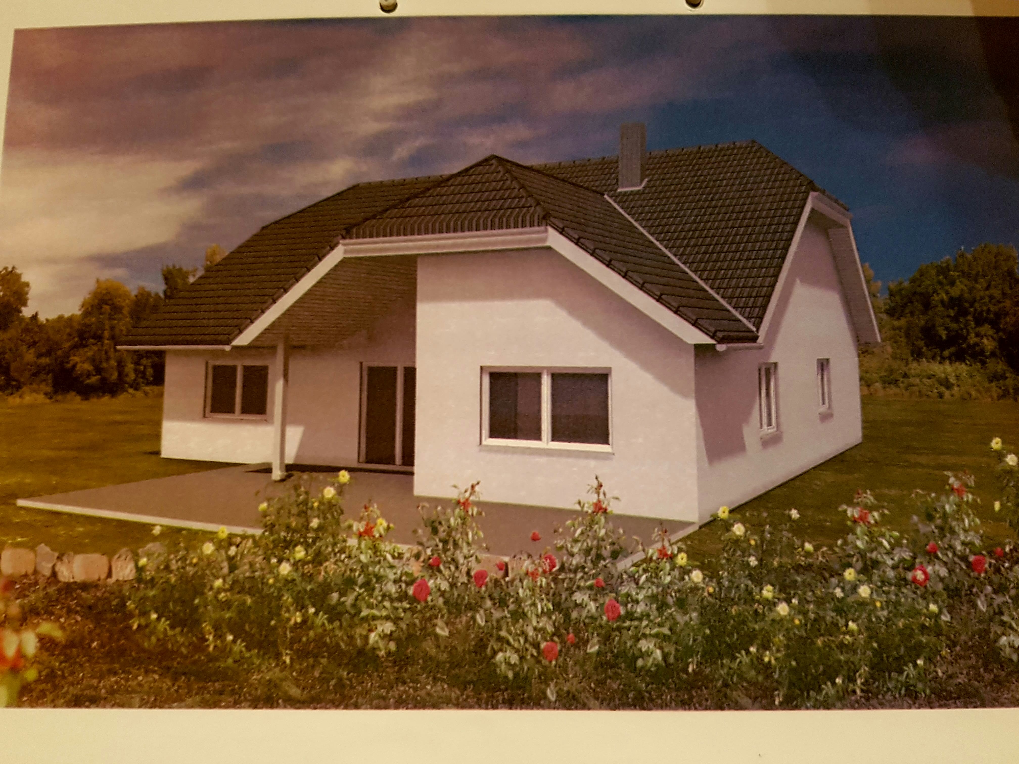 evolith-168qm-bungalow-weisser-putz-mit-grauschwarzen-schindeln-177028-6.jpg