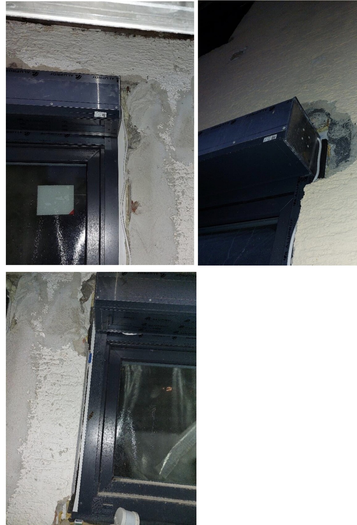 Dunkler Fensterrahmen in roher verputzter Wand mit Reparaturmörtel um die Fuge.
