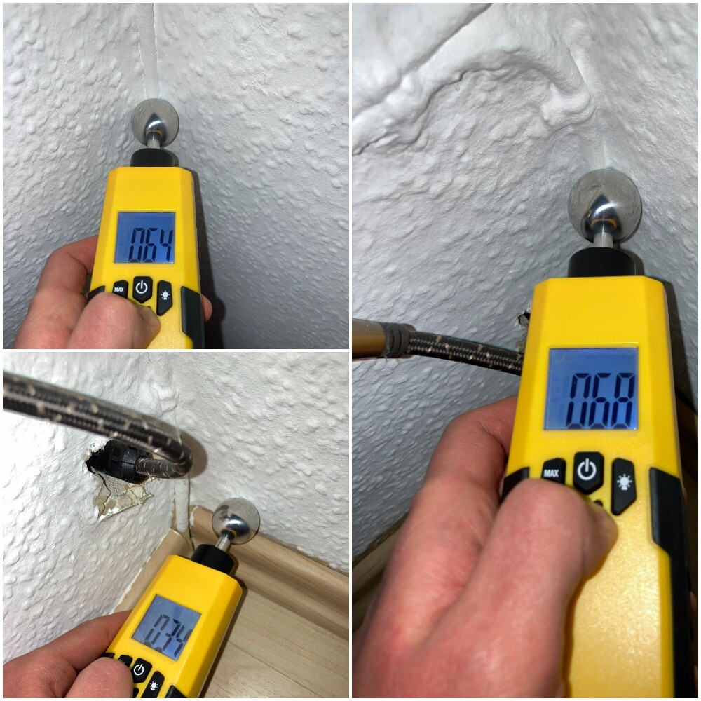 Digitaler Feuchtigkeitsmesser misst Wandfeuchte an rauer Innenwand; Werte ca. 0,6.