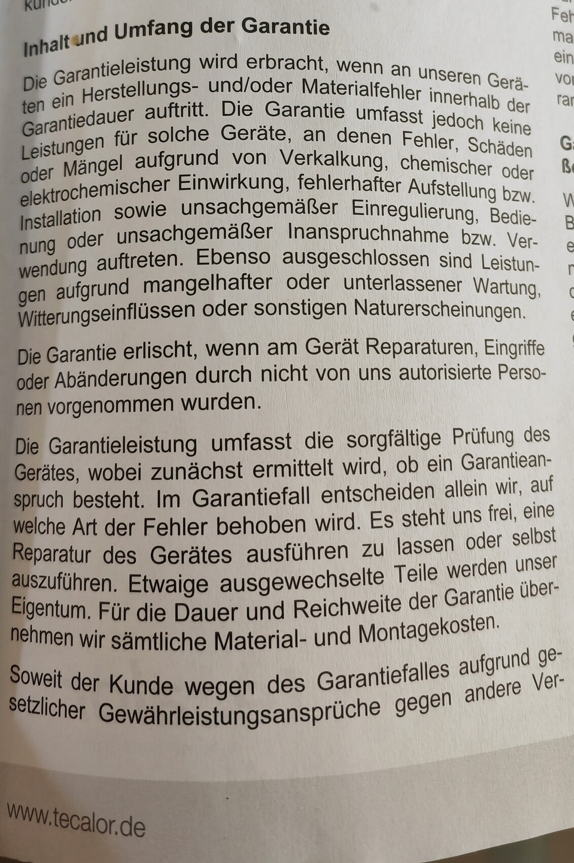 Seitenabbildung mit Garantiebedingungen und Überschrift 'Inhalt und Umfang der Garantie'.