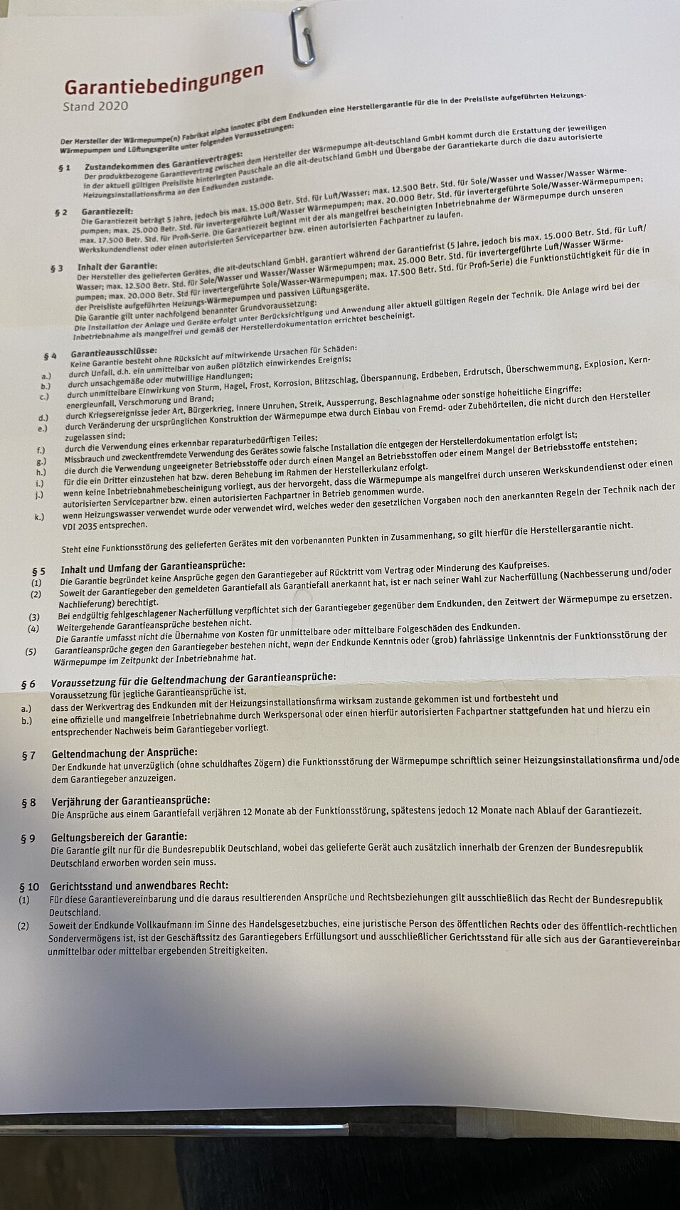 Foto eines Garantiebedingungen-Dokuments mit Paragraphen (Stand 2020).