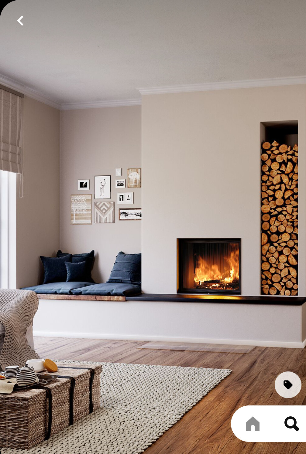 Wohnzimmer mit Kamin, brennendem Feuer, Holzstapel-Nische, Sitzbank mit Kissen, Bildergalerie.
