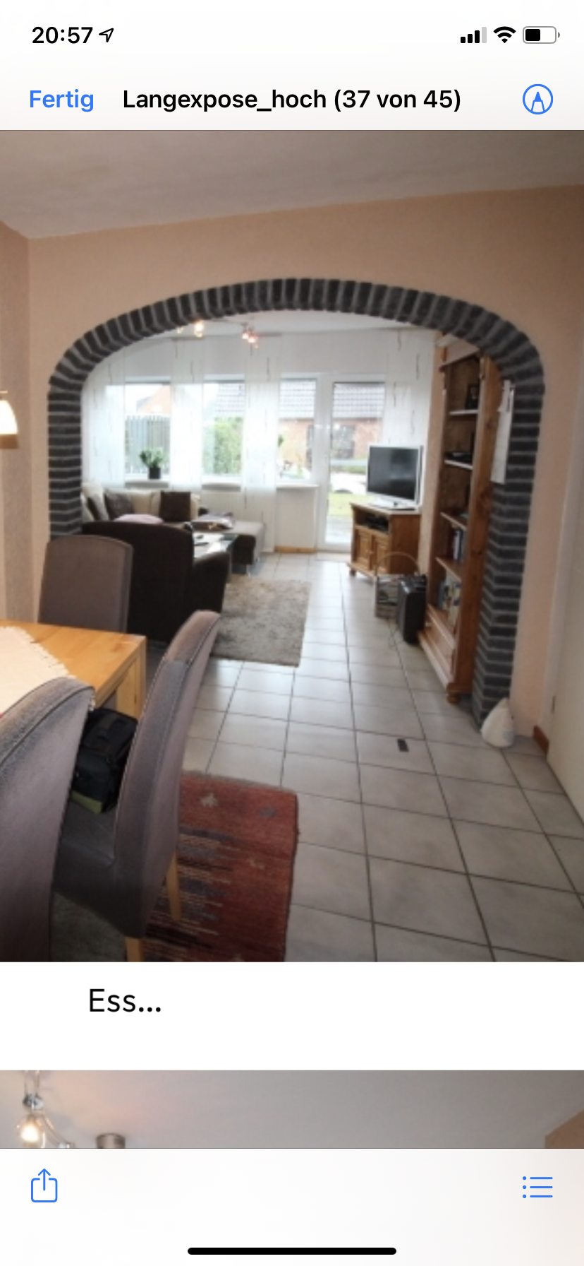 gemutliches-wohnzimmer-mit-ziegelbogen-arch.png