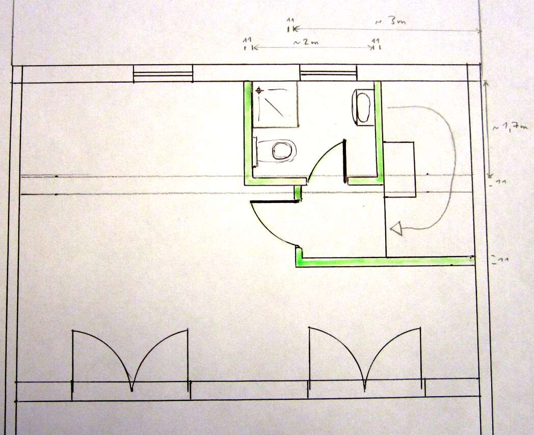 Skizzenhafter Grundriss eines Badezimmers mit Toilette und Waschbecken.