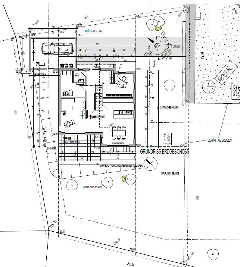 Grundriss Erdgeschoss: Wohnzimmer, Küche, Essbereich, Treppe, Garage und Garten.