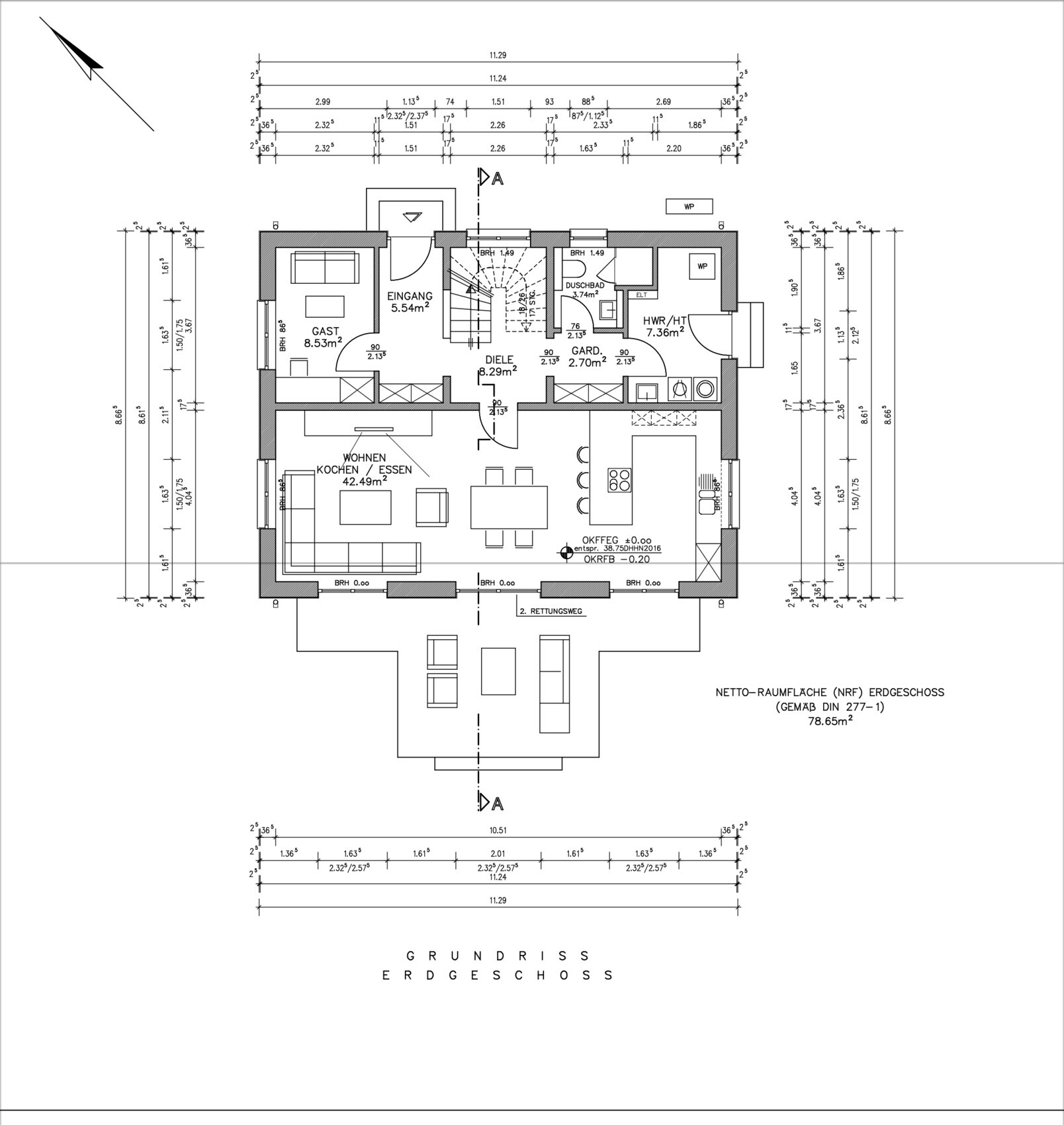 Grundriss Erdgeschoss: Offener Wohnbereich mit Küche, Gästezimmer, Flur, Bad, Treppe, Terrasse.