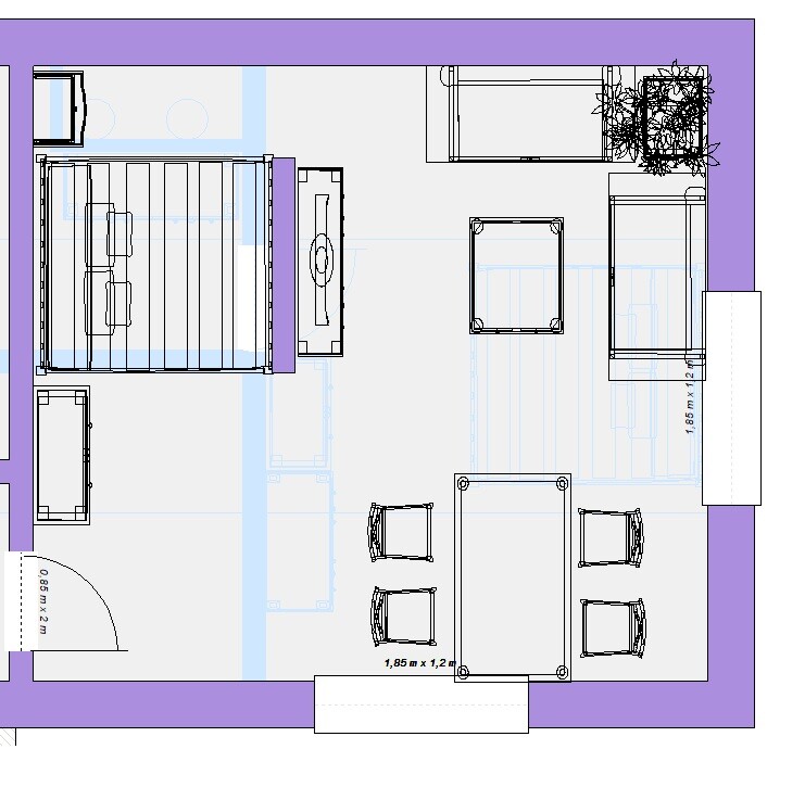 Grundriss eines Wohn- und Schlafraums: Bett links, Esstisch unten, Sofa rechts.