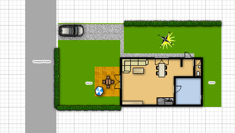 Top-Ansicht eines Grundstücksplans mit Haus, Einfahrt, Garten und Terrasse.