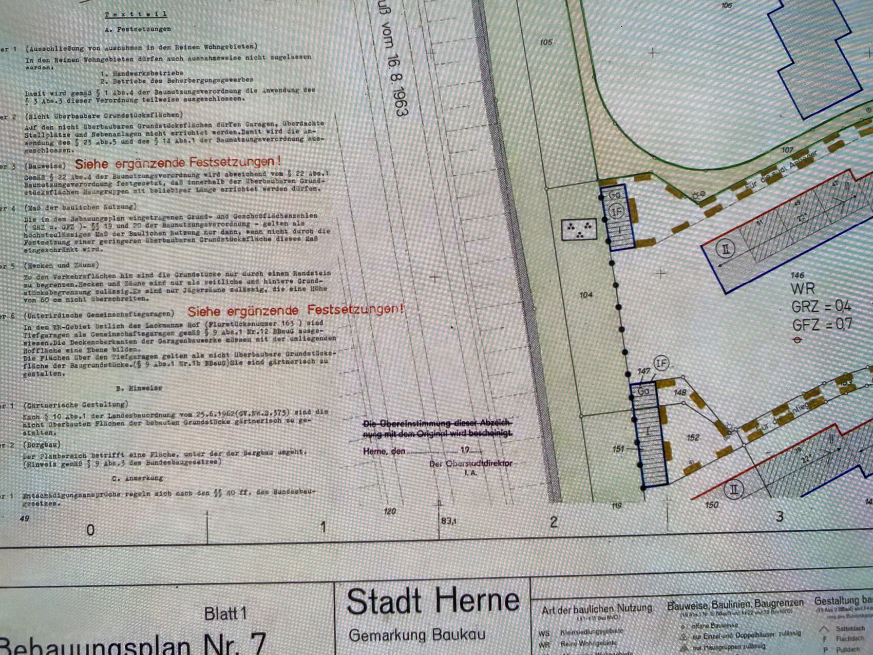 Bebauungsplan der Stadt Herne mit Grundstücksgrenzen, Gebäudeflächen und Textblöcken.