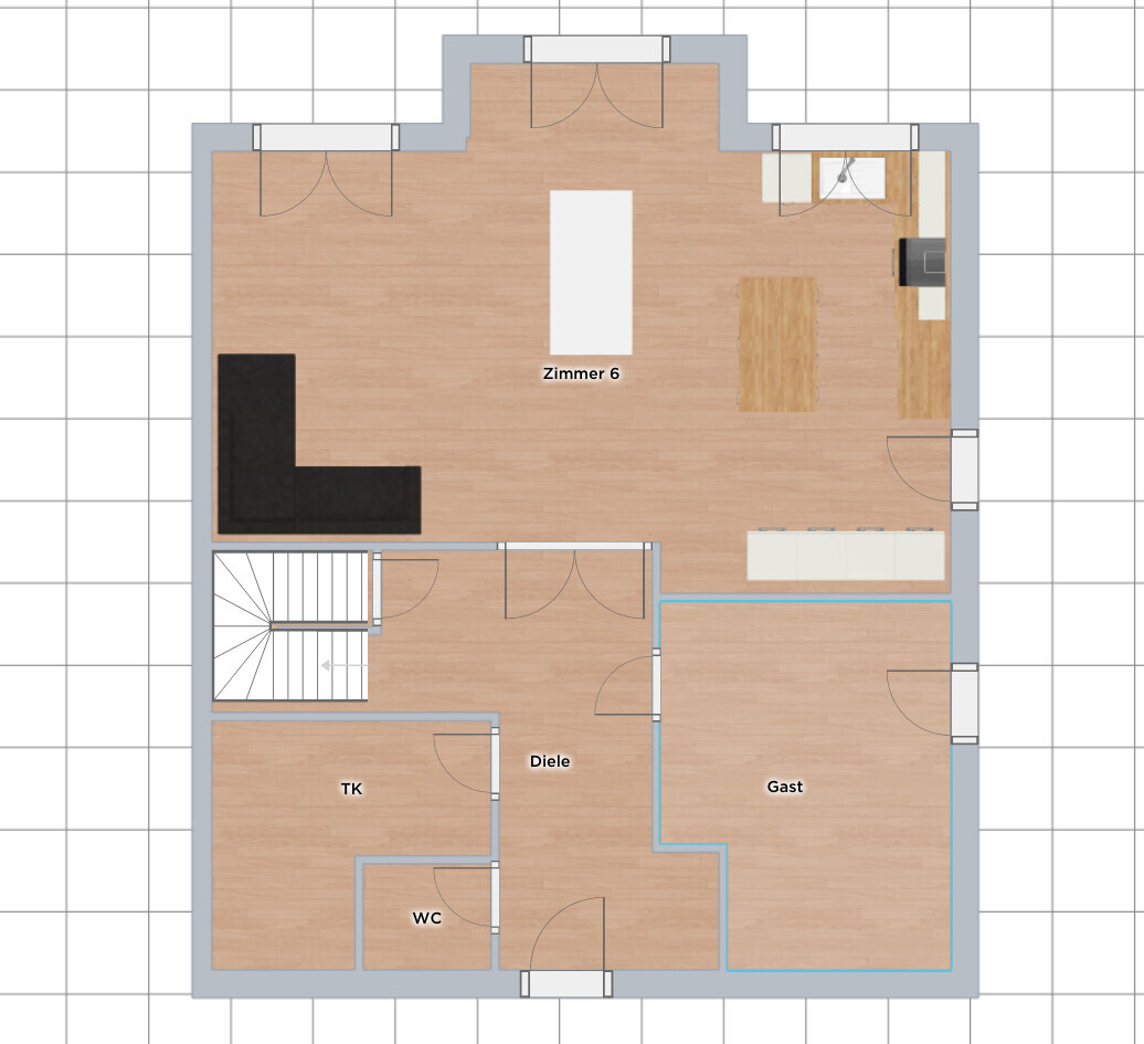 Grundriss eines Hauses: Wohnzimmer mit L-Couch, Esstisch, Küche, Diele, Gast, TK, WC, Treppe.