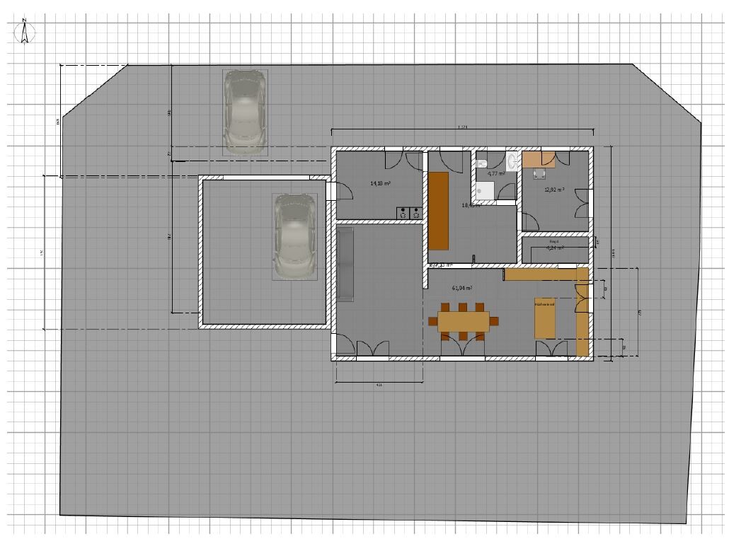 Grundriss eines Hauses mit Garage, Küche, Essbereich, Wohnzimmer, Bad, Schlafzimmer