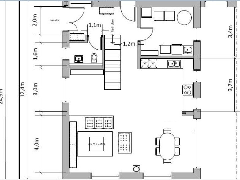 2D-Grundriss eines Hauses mit Küche, Essbereich, Wohnzimmer und Treppe